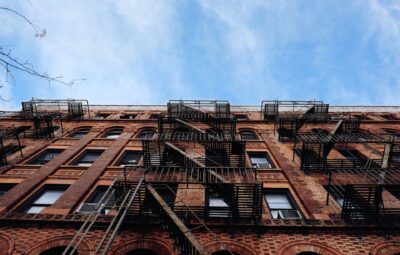 A picture of an apartment complex that was renovated, like the renovation projects of Jerome Karam and JMK5 Holdings.